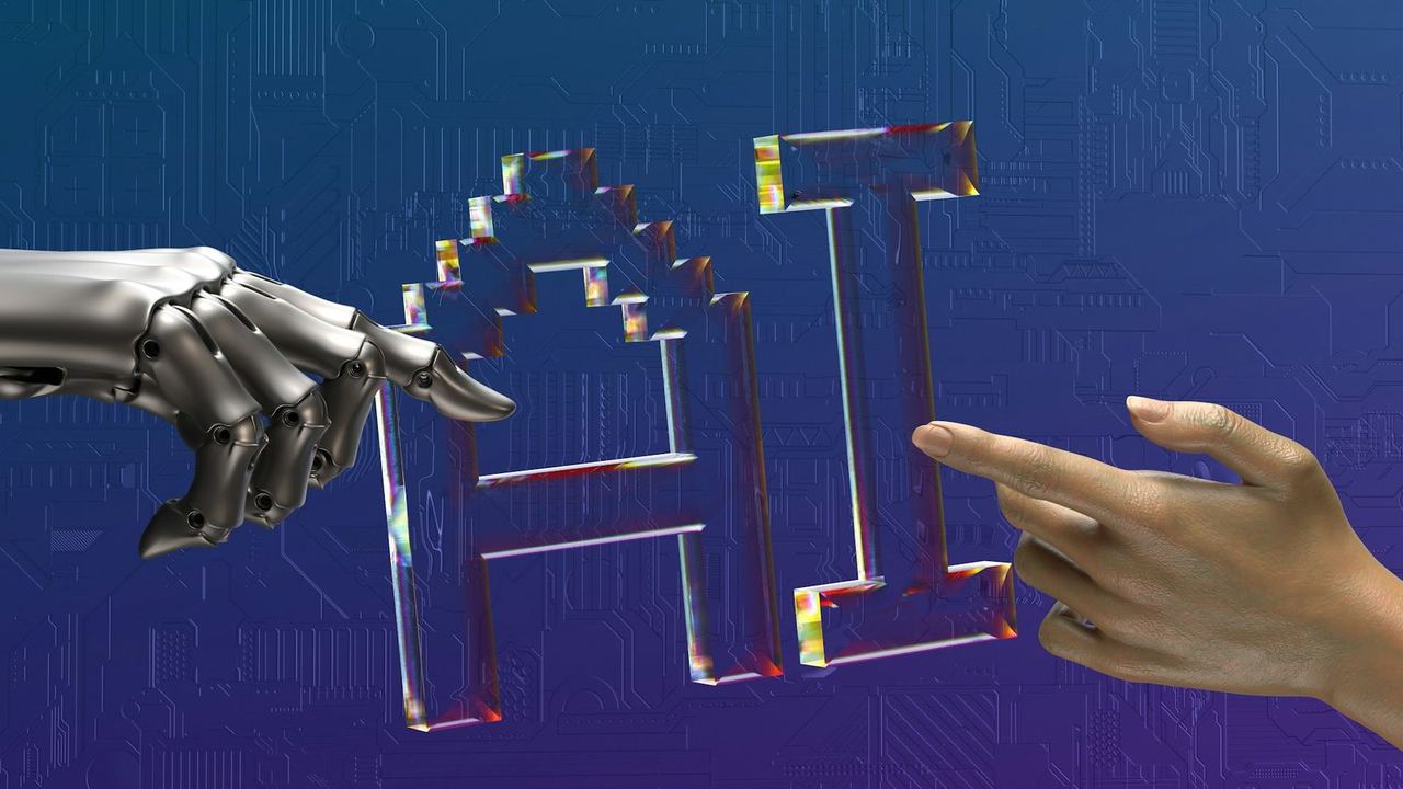 Une main robotique et une main humaine se tendant vers les lettres AI